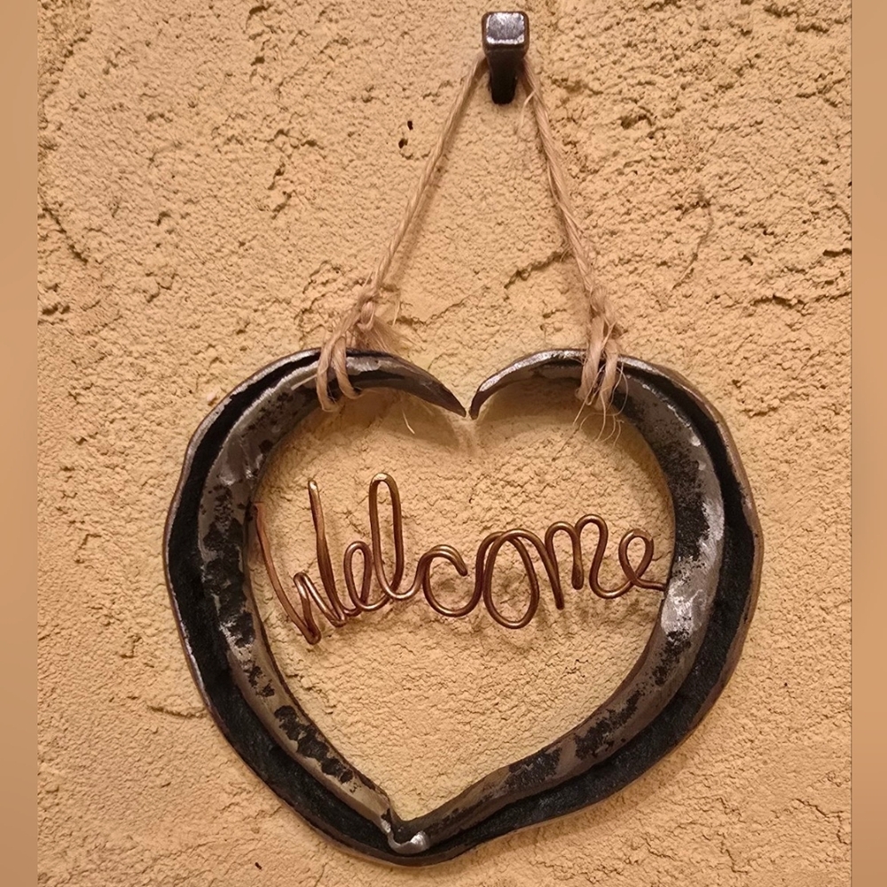 My artist friend makes these from horseshoes!